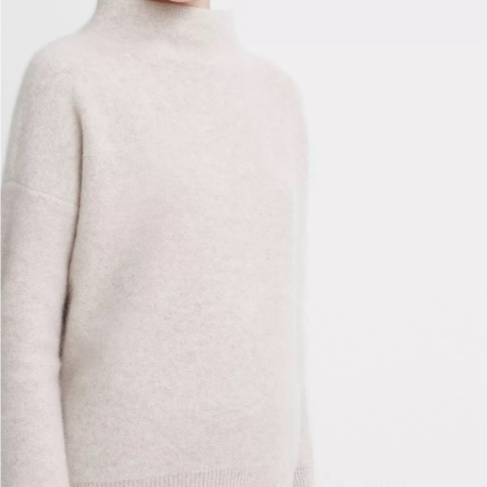 Cream colored Vince cashmere sweater. Never worn. Like new. Size medium